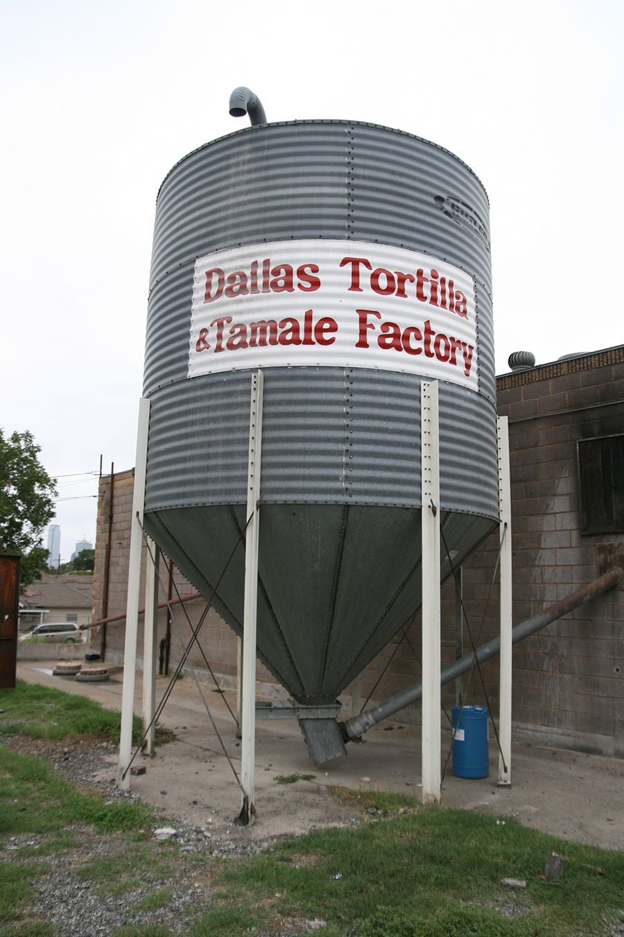 The Dallas Tortilla & Tamale Factory silo, painted with the shop's name